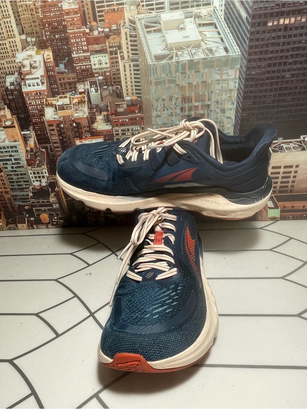 Altra women’s Navy with Orange Accent Road Running Sneakers